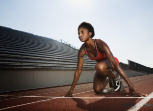 Athletic woman preparing for race